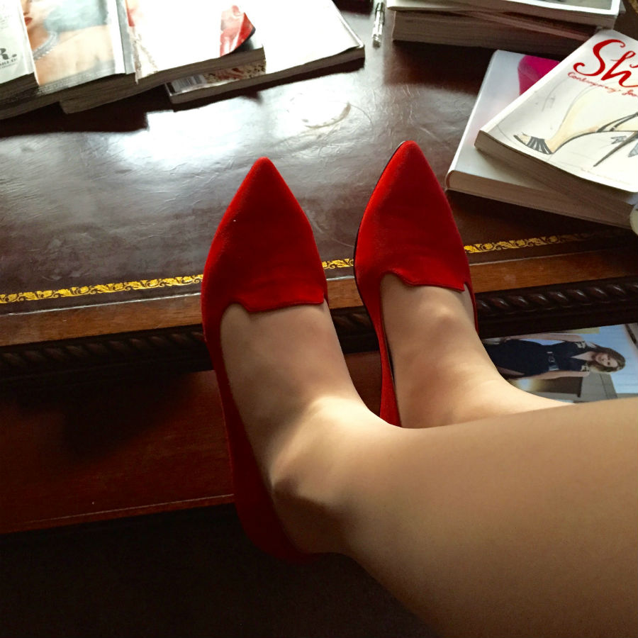 Red Suede Smoking Slippers on Coffee Table